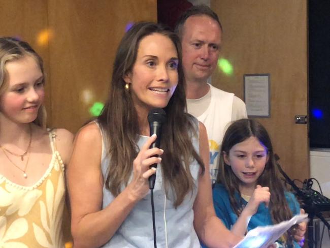 Independent candidate for Pittwater Jacqui Scruby celebrates her likely victory on Saturday night with her husband Michael and their two daughters. Picture: Jim O’Rourke