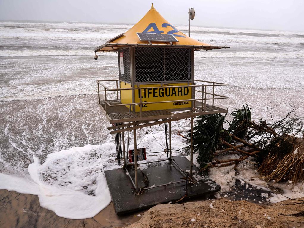 A lifeguard tower is surrounded by water on Main Beach on the Gold Coast. Picture: David Gray