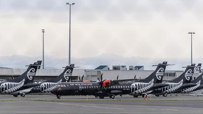 Unused Air New Zealand domestic planes are seen at Christchurch International Airport. Picture: Kai Schwoerer/Getty Images.