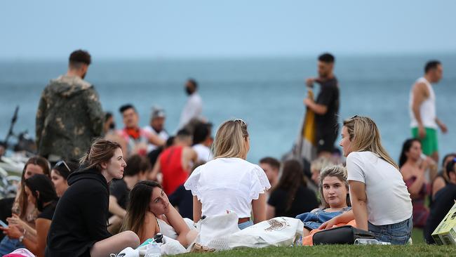 Melburnians are allowed to gather in groups of five if they live across two households or less Picture: Ian Currie