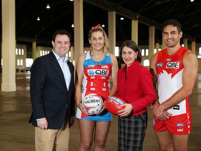 NSW Minister for Sports Stuart Ayres and NSW Premier Gladys Berejiklian with NSW Swifts netballer Sophie Garbin and Sydney Swans captain Josh Kennedy at the announcement of a $65 million facility at Moore Park.