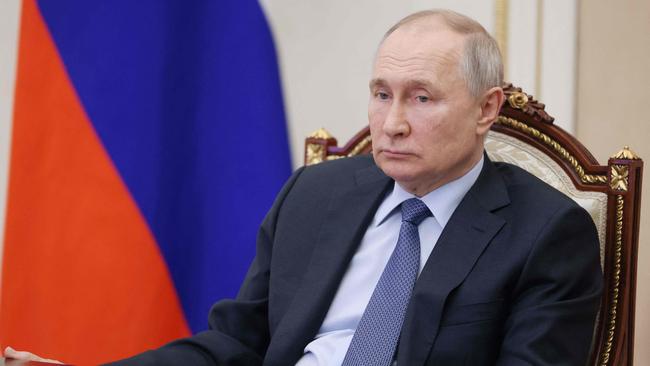 Russian President Vladimir Putin has been issued an arrest warrant on the war crime accusation of unlawfully deporting Ukrainian children. Picture: AFP