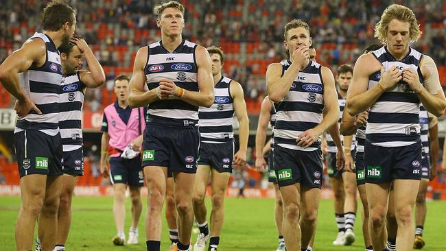 Geelong players walk off Metricon Stadium. Picture: Getty