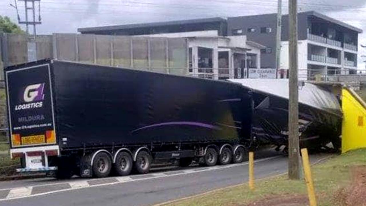 A B-double semi trailer has become wedged under the Corinda Underpass after miss judging the height Picture Facebook/Corinda Sherwood Community page