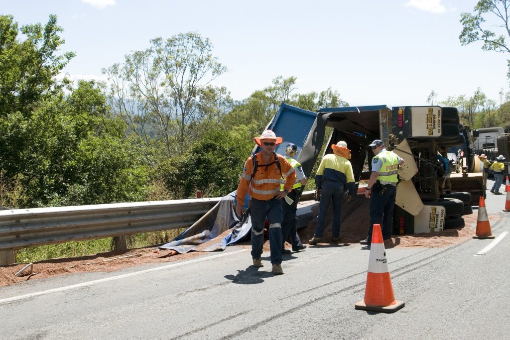 A runaway trailer rolled on the Toowoomba Range, blocking both eastbound lanes for hours. Picture: Kevin Farmer