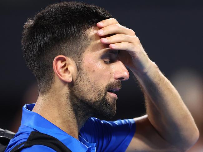 BRISBANE, AUSTRALIA - JANUARY 03: Novak Djokovic of Serbia leaves the court after losing his quarter-final match against Reilly Opelka of the USA during day six of the 2025 Brisbane International at Pat Rafter Arena on January 03, 2025 in Brisbane, Australia. (Photo by Chris Hyde/Getty Images)