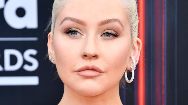 Singer Christina Aguilera has been criticised for charging more for bigger sizes of her tour merchandise. Picture: Frazer Harrison/Getty Images