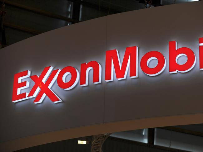 (FILES) In this file photo taken on June 2, 2015 the logo of US oil and gas giant ExxonMobil is seen during the World Gas Conference exhibition in Paris. - A New York judge sided with Exxon Mobil on December 10, 2019 in a closely-watched environmental case, concluding the oil giant did not mislead investors in its climate change disclosures. The ruling by Barry Ostrager, a judge in the New York state court, rejected arguments by New York's Attorney General that the oil giant duped investors by downplaying the costs of mitigating climate change. (Photo by ERIC PIERMONT / AFP)