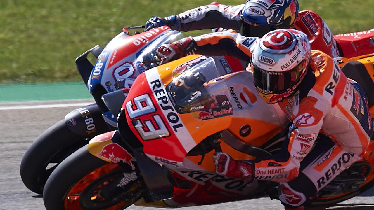 Marc Marquez won an enthralling Aragon MotoGP over title rival Andrea Dovizioso.