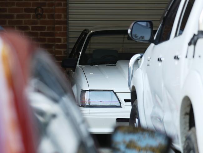 A collection of expensive and rare cars at Enzo Guarinoni’s Picton address, seen during the NSW Police raid. Picture: John Grainger
