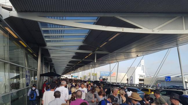 Woman arrested at Sydney airport about to board a plane to New Zealand. Picture Twitter supplied.