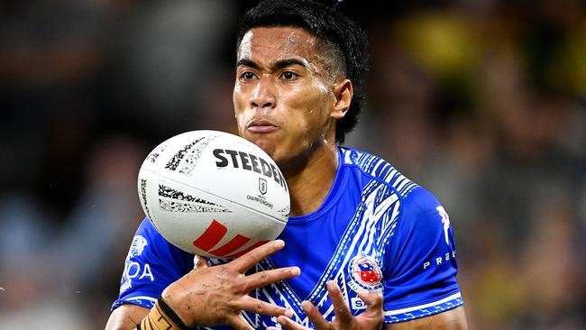 TOWNSVILLE, AUSTRALIA - OCTOBER 14: Sualauvi Faalogo of Samoa catches the ball during the Mens Pacific Championship match between Australia Kangaroos and Samoa at Queensland Country Bank Stadium on October 14, 2023 in Townsville, Australia. (Photo by Ian Hitchcock/Getty Images)