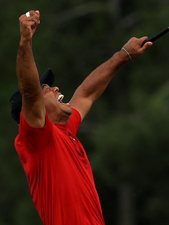 Tiger Woods celebrates winning the 2019 Masters. (Photo by Mike Ehrmann/Getty Images)