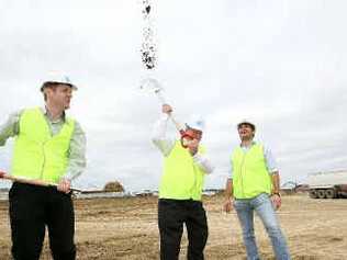 Woolworths community relations manager Simon Berger (left), Mayor Col Meng and Hutchinson Builders regional manager Levi Corby turn the first sod of the new Woolworths development at Ooralea. Picture: Lee Constable