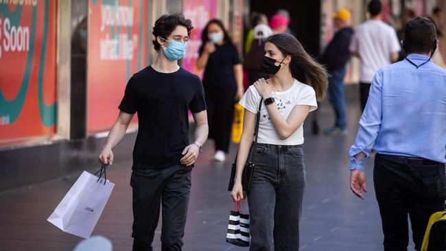 Experts recommend masks continue to be worn in retail. Picture: Paul Jeffers.