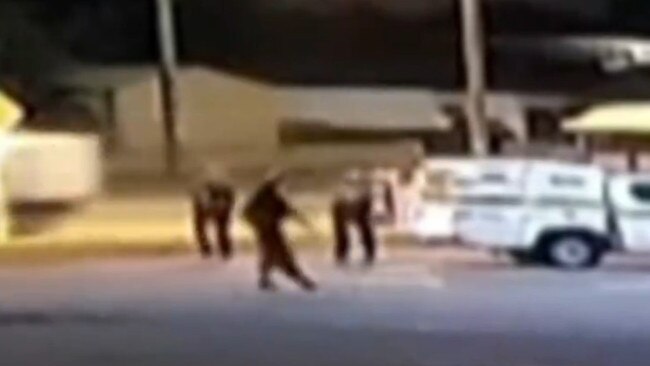 CCTV footage shows a teenager wielding a knife before being shot by police after stabbing a man in a suburban car park in Perth. Picture: 7News