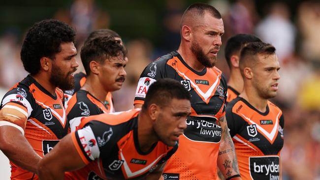 SYDNEY, AUSTRALIA – MARCH 12: David Klemmer of the Wests Tigers and teammates look on during the round two NRL match between Wests Tigers and Newcastle Knights at Leichhardt Oval on March 12, 2023 in Sydney, Australia. (Photo by Cameron Spencer/Getty Images)