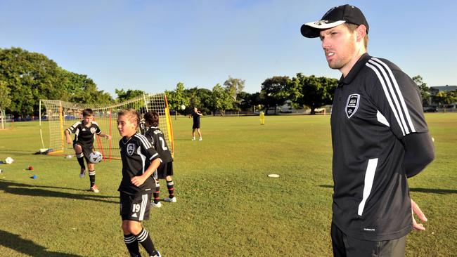 Former North Queensland Fury captain Gareth Edds with kids from his football academy He is taking them to the Gold Coast for the Gold Coast Champions Cup tournament.