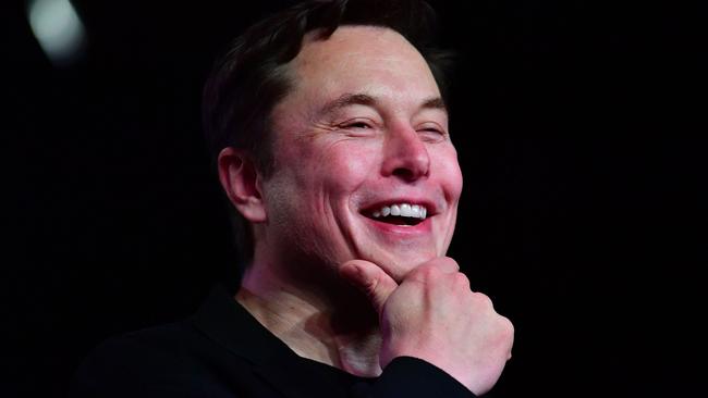 Tesla CEO Elon Musk reacts during the unveiling of the new Tesla Model Y in Hawthorne, California. (Photo by Frederic J. BROWN / AFP)