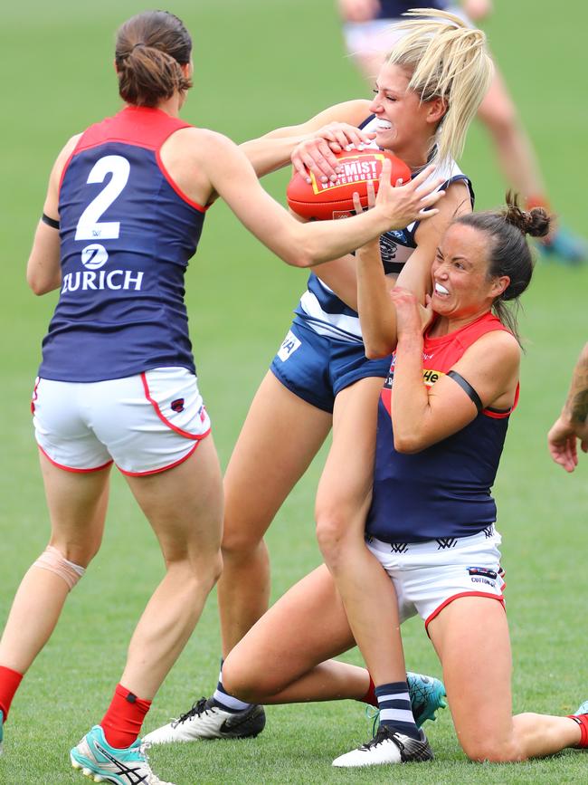 Daisy Pearce tackles Geelong’s Olivia Barber in Saturday’s practice match. Picture: Glenn Ferguson