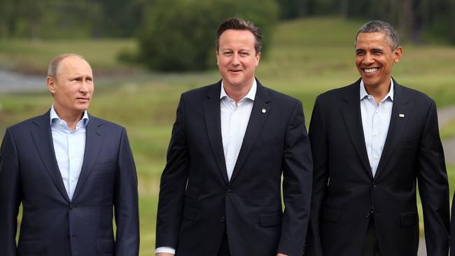 Putin with then British PM David Cameron and then US President Barack Obama. Picture: Getty Images