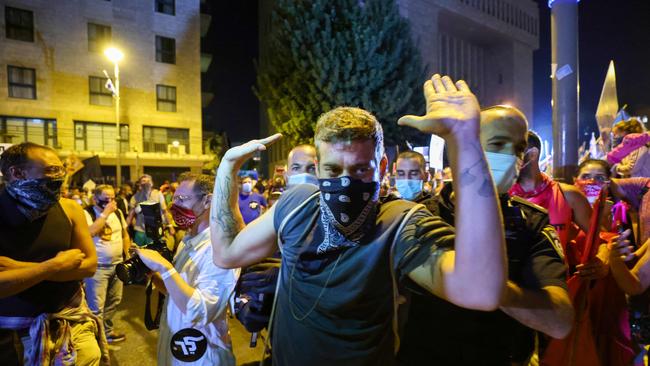 Israeli police detain a protester during a demonstration amid a second lockdown in front of Prime Minister Benjamin Netanyahu's residence in Jerusalem, on September 26. Picture: AFP