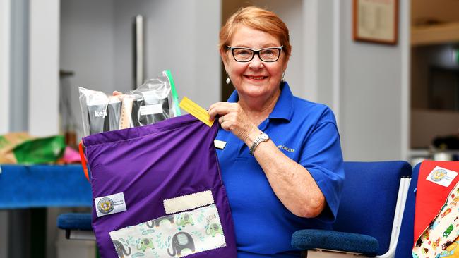 President of Soroptimist International Townsville Breakwater Janet Askern, with prison made library bags for kids. Picture: Alix Sweeney