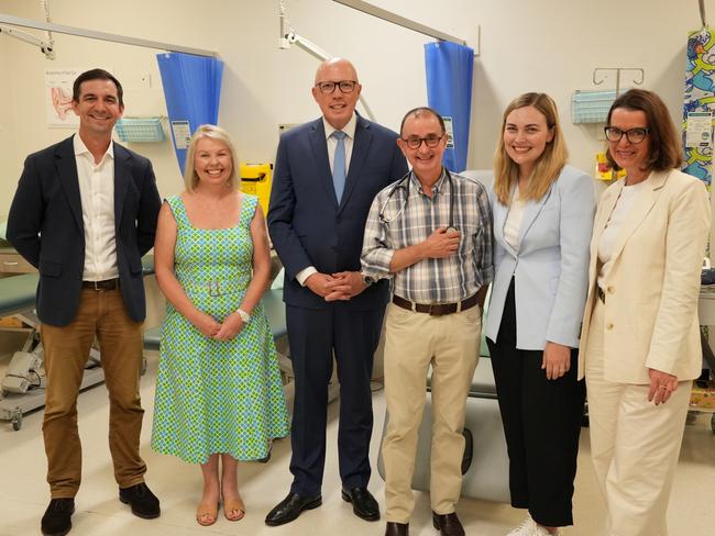 23-02-2025 - (L-R) Trevor Evans (Liberal National candidate for Brisbane), Janelle Sapsford, Peter Dutton, Janelle's husband Rick Sapsford (GP), Maggie Forrest (Liberal National candidate for Ryan) &  Anne Ruston photographed at the Radius Medical Centre in Albany Hills, QLD.