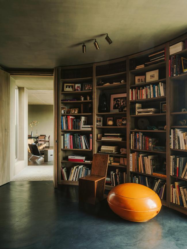 The library (with a convertible plastic seat by Peter Ghyczy). Picture: Salva López for WSJ. Magazine