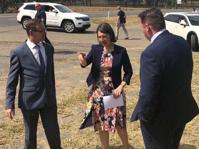 Premier Gladys Berejiklian announces the first state of the Spring Farm Parkway with Wollondilly candidate Nathaniel Smith (right) and Camden candidate Peter Sidgreaves. Picture: Daniel Zautsen