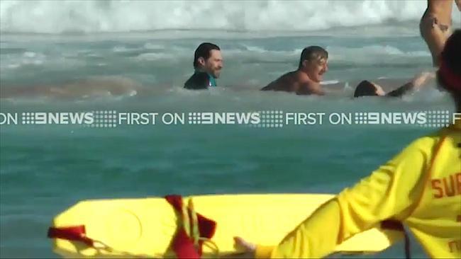 Hugh Jackman rescues son at Bondi