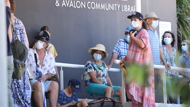 Locals awaiting testing at a pop up testing clinic in Avalon today. Picture: Tim Hunter