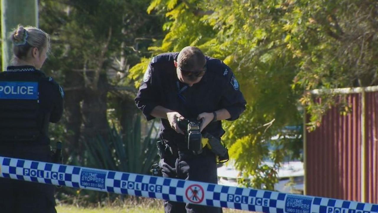 Police at the scene of an alleged murder at Daisy Hill on Friday.