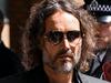 Russell Brand pleads not guilty to rape, sexual assault