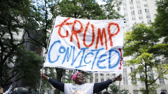 People react after former US President and Republican presidential candidate Donald Trump was convicted. Picture: Kena Betancur / AFP
