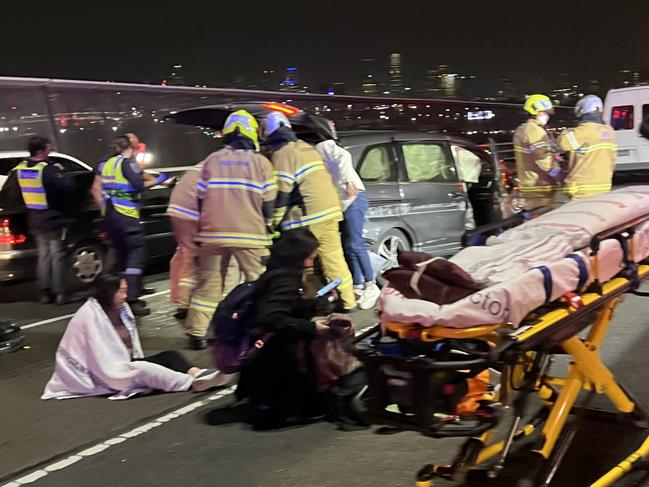 Traffic has been banked up on West Gate Freeway after a serious collision on Sunday night., , Multiple lanes were closed heading into the city with police, firefighters and paramedics all on-scene following what appearedto be a multi-car crash.  Picture: Andrew Faram