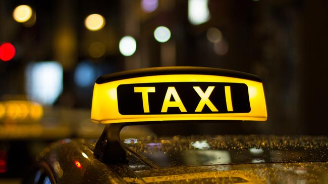 A taxi at night. Generic image.