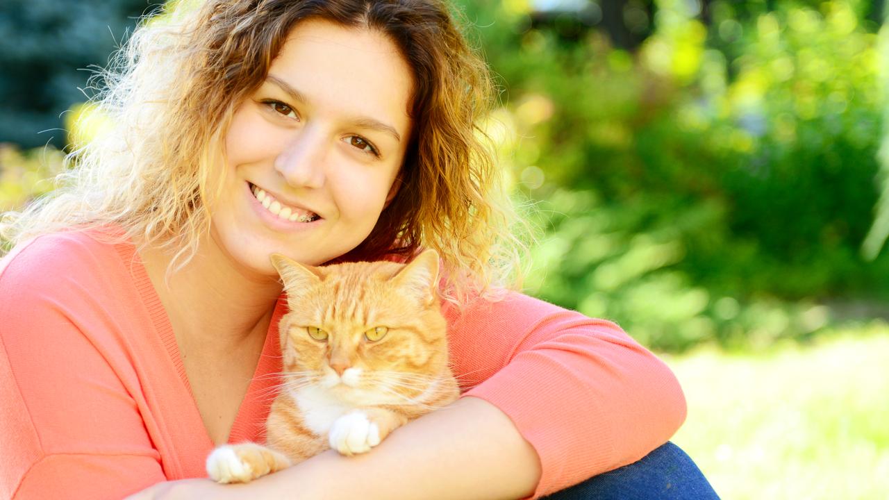 Girl with cat - debunking the myth that drives woman nuts.