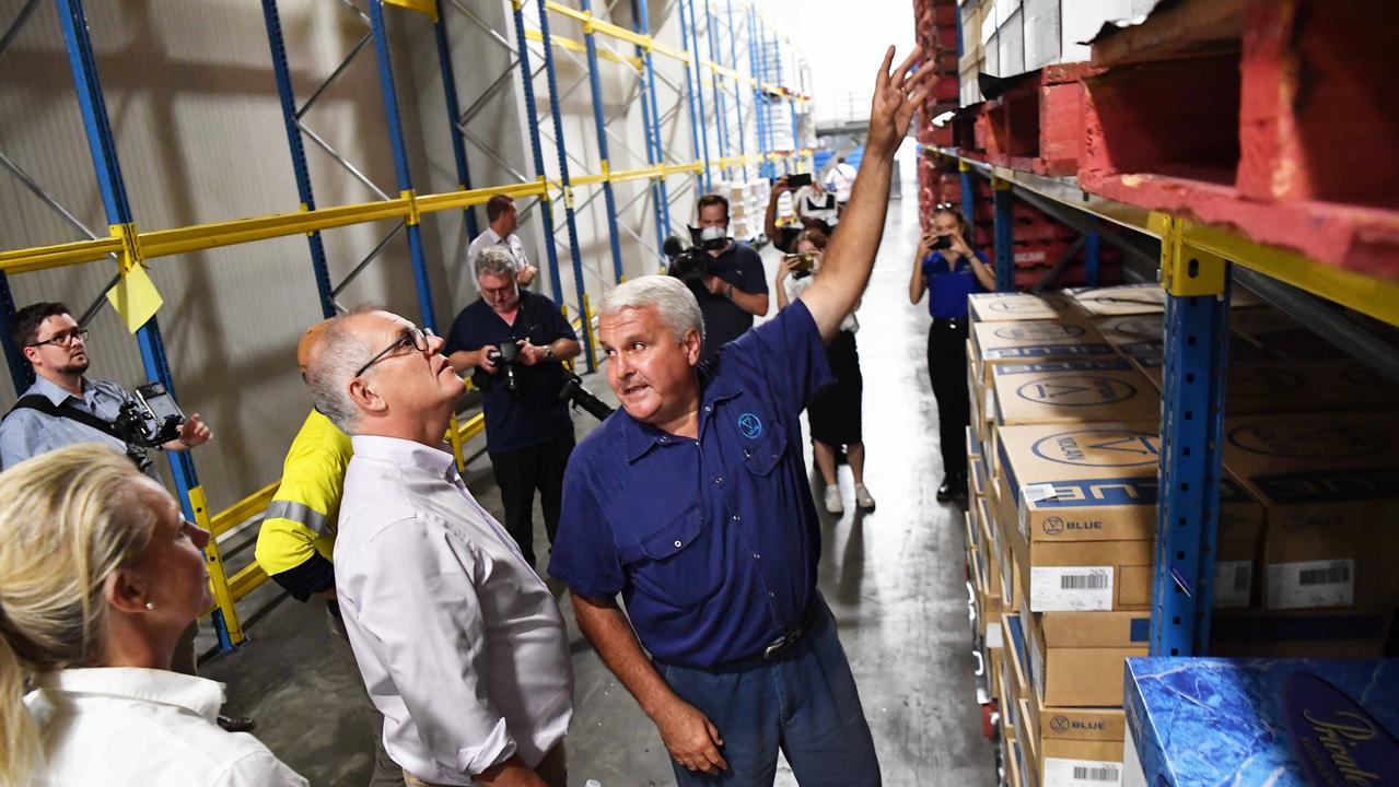 Prime Minster Scott Morrison visits Nolan Meats, Gympie, after devastating floods. Pictured with Terry Nolan. Photo: Patrick Woods.