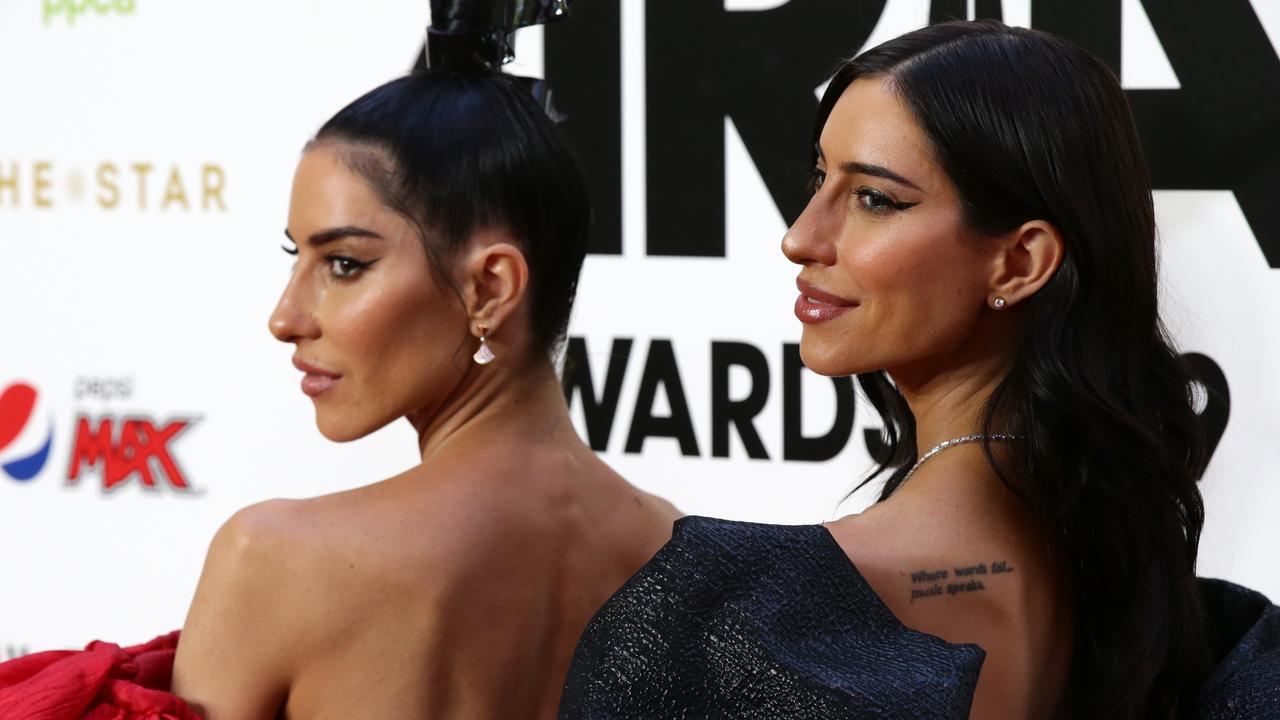 The Veronicas pose for photographers on the red carpet at the 2019 ARIA Awards. Picture: Jonathan Ng