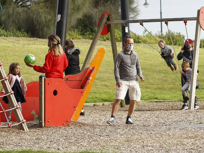 MELBOURNE, AUSTRALIA - SEPTEMBER 14: People enjoy the playground at Elwood beach on September 14, 2020 in Melbourne, Australia. Metropolitan Melbourne's stage 4 lockdown restrictions have been eased slightly as of midnight 14 September, with the curfew eased to 9pm to 5am. Permitted exercise time has increased to two hours per day, public outdoor gatherings of two people or a household is now permitted for up to two hours while social "bubbles" will be allowed for people who live alone. Metropolitan Melbourne has been subject to Stage 4 restrictions since 2 August 2020 in response to the re-emergence of COVID-19 in the community.  (Photo by Daniel Pockett/Getty Images)