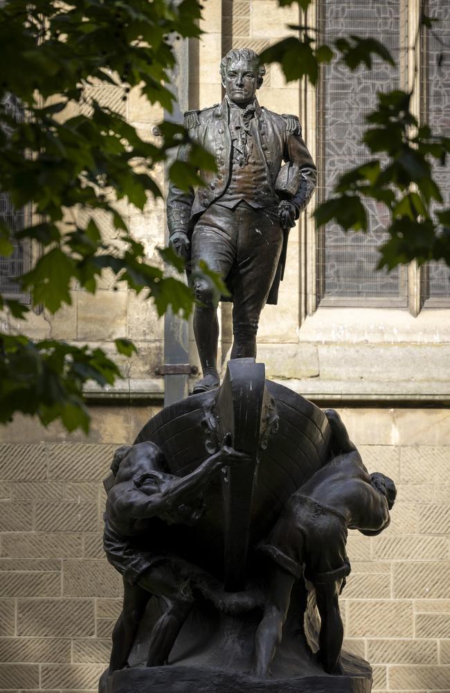 Standing firm in the face of danger ... the Matthew Flinders statue at St Paul’s Cathedral, Melbourne.