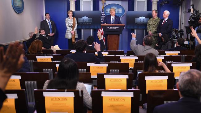 US President Donald Trump flanked by Response co-ordinator for White House Coronavirus Task Force Deborah Birx, Rear Adm. John Polowczyk and US Vice President Mike Pence takes questions from the press core during an unscheduled briefing after a Coronavirus Task Force meeting at the White House. Picture: AFP