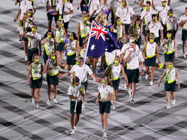 Tokyo 2020 flag bearers Cate Campbell and Patty Mills lead the Australian team in during the Opening Ceremony of the Tokyo 2020 Olympic Games. Picture: Getty Images