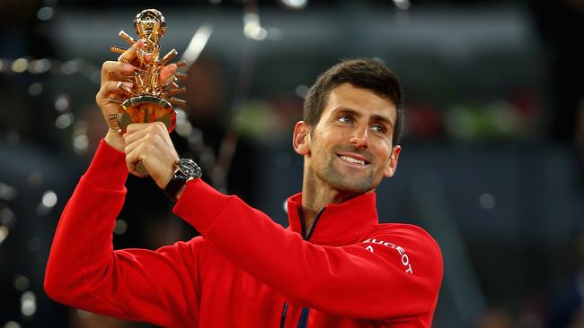 Novak Djokovic celebrates his title in the Madrid Open.