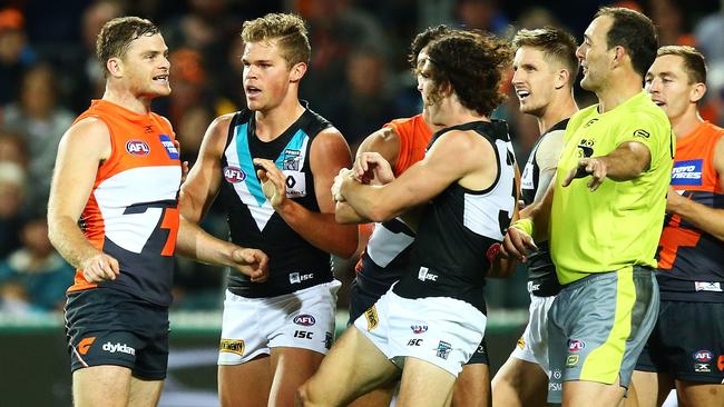 Heath Shaw gets into a stoush with Port Adelaide players earlier this year.