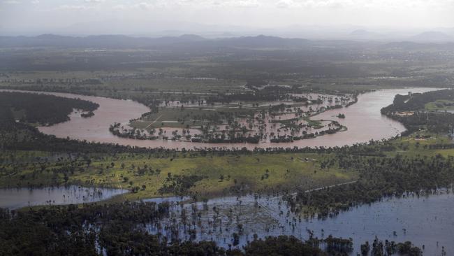 The swollen Fitzroy River in Rockhampton on Monday. Picture: AAP Image/Dan Peled