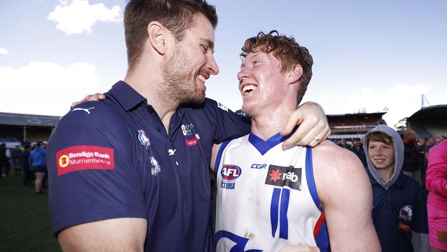 Matthew Rowell celebrates his NAB League premiership with Oakleigh Chargers.