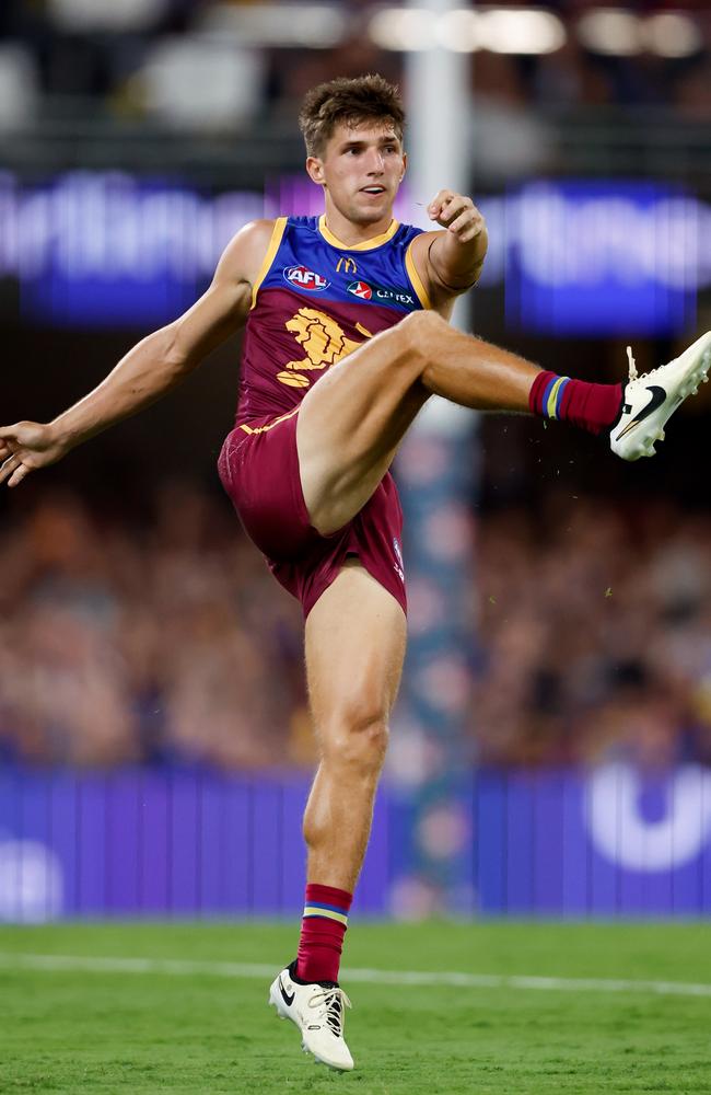 Zac Bailey of the Lions mid kick against the Blues. Picture: Dylan Burns/AFL Photos via Getty Images.