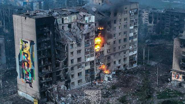 An apartment block on fire after an attack in the Ukraine city of Bakhmut. Picture: AFP.